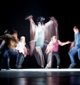 group of people dancing photo